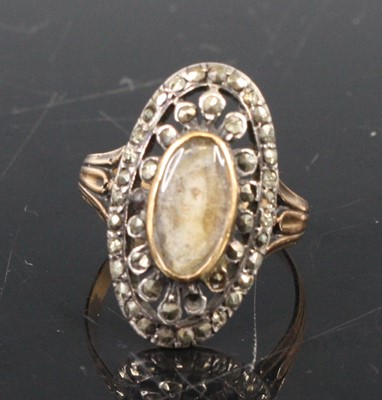 Lot 367 - A 19th century yellow metal mourning ring, the...