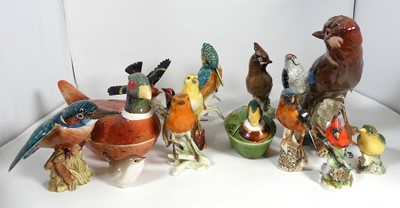 Lot 154 - A collection of porcelain models of birds, to...