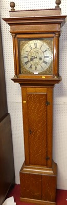 Lot 1134 - A circa 1800 provincial oak long case clock,...