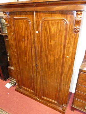 Lot 1136 - A mid-Victorian flame mahogany double door...