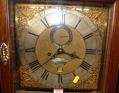 Lot 1137 - A circa 1800 provincial oak long case clock,...