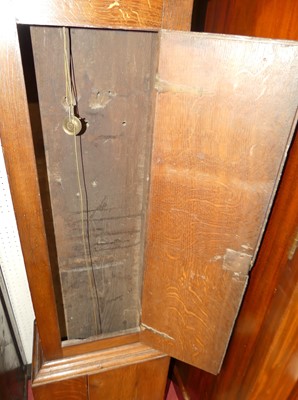 Lot 1137 - A circa 1800 provincial oak long case clock,...