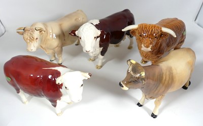 Lot 196 - A collection of five Beswick figures of bulls,...