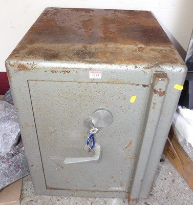 Lot 1145 - A mid-20th century cast iron floor safe by the...