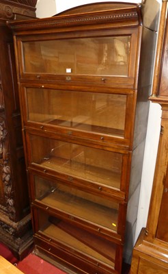 Lot 1180 - A 1930s beech five-tier stacking bookcase by...