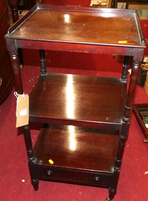 Lot 1192 - A Regency mahogany three-tier whatnot, having...