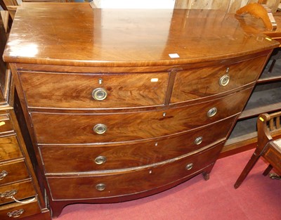 Lot 1247 - A Regency mahogany bowfront chest of two short...