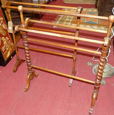 Lot 1248 - An Aesthetic Movement turned towel rail;...