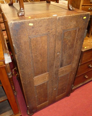 Lot 1251 - A made-up oak double-door side cupboard, on...