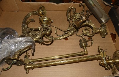 Lot 1280 - A set of six cast gilt metal twin branch wall...