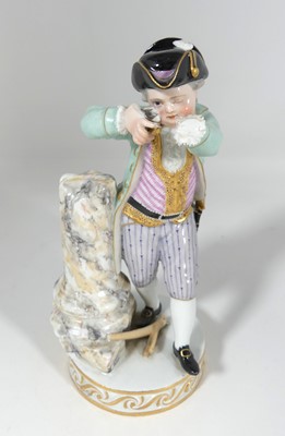 Lot 211 - A Meissen porcelain figure of a soldier,...