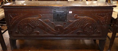 Lot 1295 - A 17th century and later relief carved boarded...