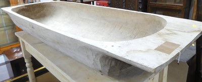 Lot 1297 - A carved softwood long trough, length 158cm