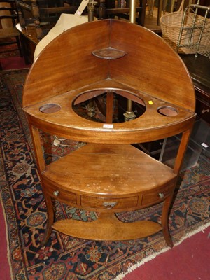 Lot 1317 - An early 19th century mahogany bowfront washstand