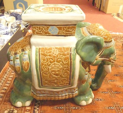 Lot 615 - A ceramic elephant seat, height 45cm.