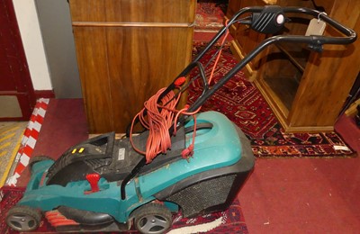 Lot 1353 - A Bosch electric powered lawn mower, with...