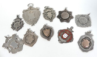 Lot 247 - A collection of silver fob medals, Edwardian...