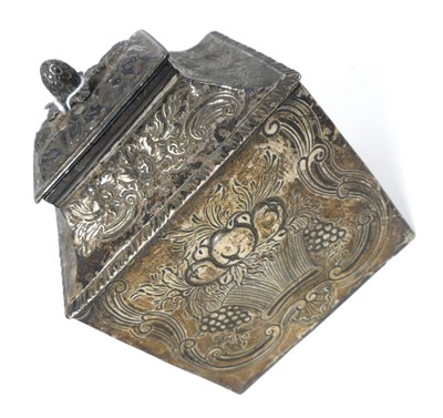 Lot 248 - A white metal tea caddy, having a pineapple...