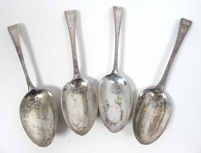 Lot 259 - A matched set of four silver tablespoons in...