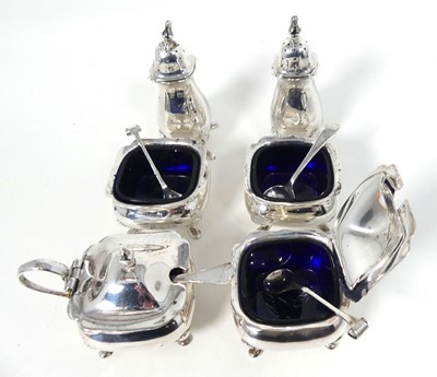 Lot 262 - An Edwardian silver six-piece cruet set;...