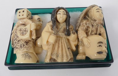 Lot 446 - Three reproduction Japanese carved resin netsuki