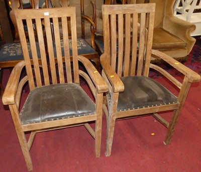 Lot 1365 - A pair of contemporary slat back conservatory...