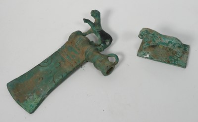 Lot 520 - A reproduction zoomorphic iron age axe head;...