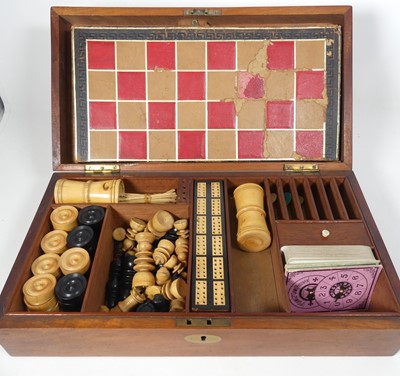 Lot 521 - A 19th century mahogany cased games compendium,...