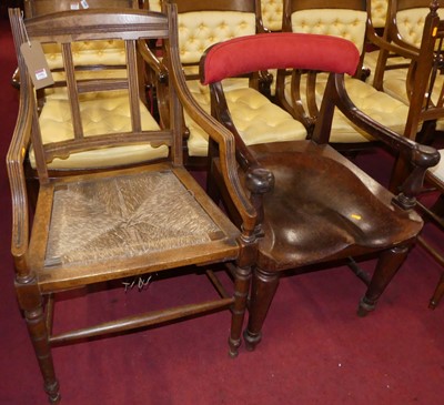 Lot 1390 - A 19th century mahogany bar back elbow chair,...