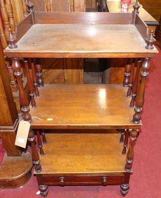 Lot 1400 - A mid-Victorian mahogany three-tier whatnot,...