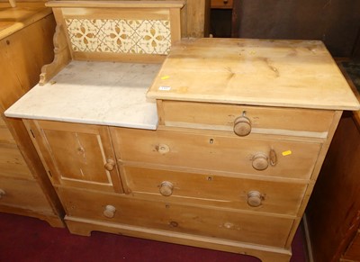 Lot 1411 - An Edwardian pine wash chest, having sunken...