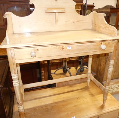 Lot 1412 - A Victorian pine wash stand, having a scroll...