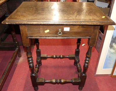 Lot 1427 - A joined oak and beech single drawer side...