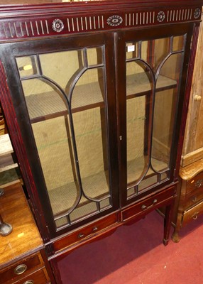 Lot 1435 - An Edwardian mahogany double-door glazed china...