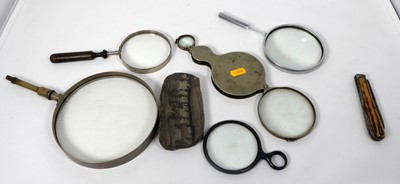 Lot 469 - A collection of magnifying glasses together...