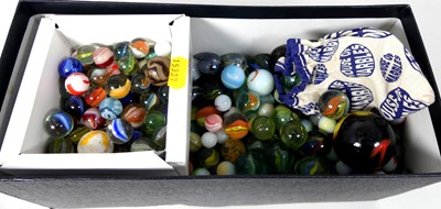 Lot 475 - A collection of glass marbles to include lata...