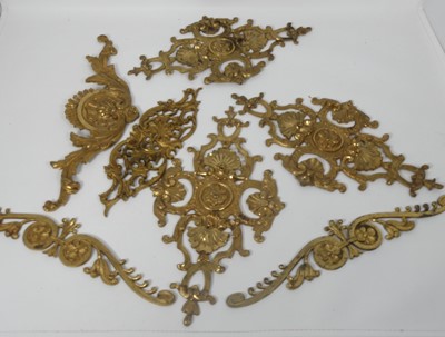 Lot 508 - A collection of gilt metal mounts to include...