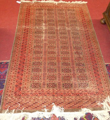 Lot 1149 - A Persian woollen red & grey ground Bokhara...