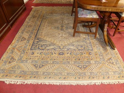 Lot 1152 - A Persian woollen pale blue and cream ground...