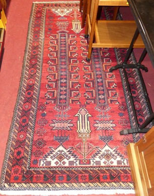 Lot 1156 - A Persian woollen red ground Karajeh rug, with...