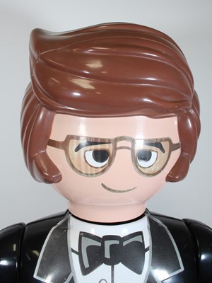 Lot 1814 - A large shop display Playmobil figure, of Rex...