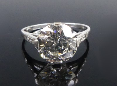 Lot A white metal diamond solitaire ring,...