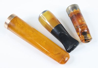 Lot 22 - A Victorian cheroot holder, having an amber...