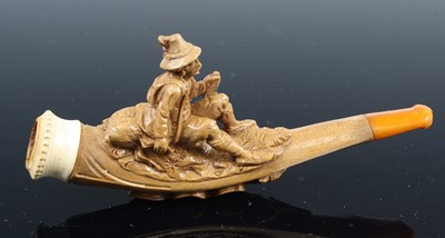 Lot 15 - A 19th century cheroot pipe, the stem carved...