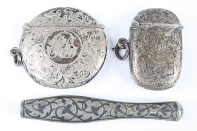 Lot 25 - An Edwardian silver vesta, of hinged circular...