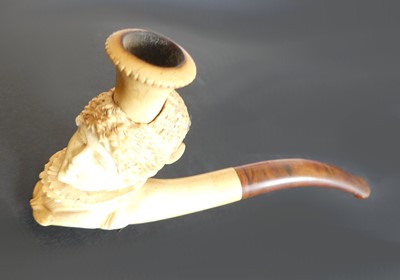 Lot 8 - A 19th century meerschaum pipe, the carving on...