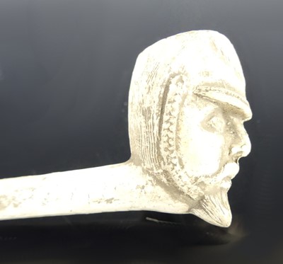 Lot 54 - An early 20th century clay pipe depicting...