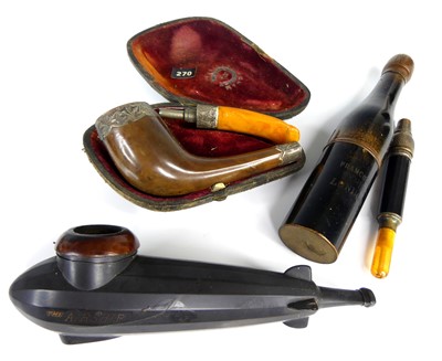 Lot 39 - A cased two piece pipe distrubuted by...