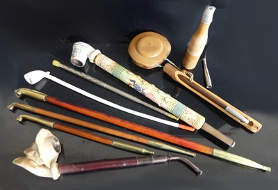 Lot 56 - A collection of Asian pipes to various...