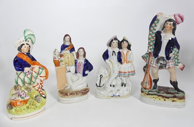 Lot 323 - An early Victorian Staffordshire figure of a...